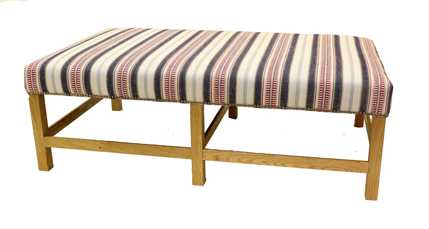 A Robert Kime-Style Ottoman, of recent date, upholstered in Shelter Stripe indigo/red fabric by