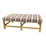 A Robert Kime-Style Ottoman, of recent date, upholstered in Shelter Stripe indigo/red fabric by