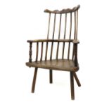 A Late 18th/Early 19th Century Ash Comb-Back Armchair, probably West Country, the double spindle