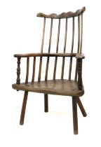 A Late 18th/Early 19th Century Ash Comb-Back Armchair, probably West Country, the double spindle