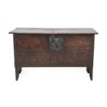 A Late 17th Century Oak Chest, of six-plank construction, the hinged lid enclosing a vacant interior