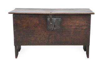 A Late 17th Century Oak Chest, of six-plank construction, the hinged lid enclosing a vacant interior