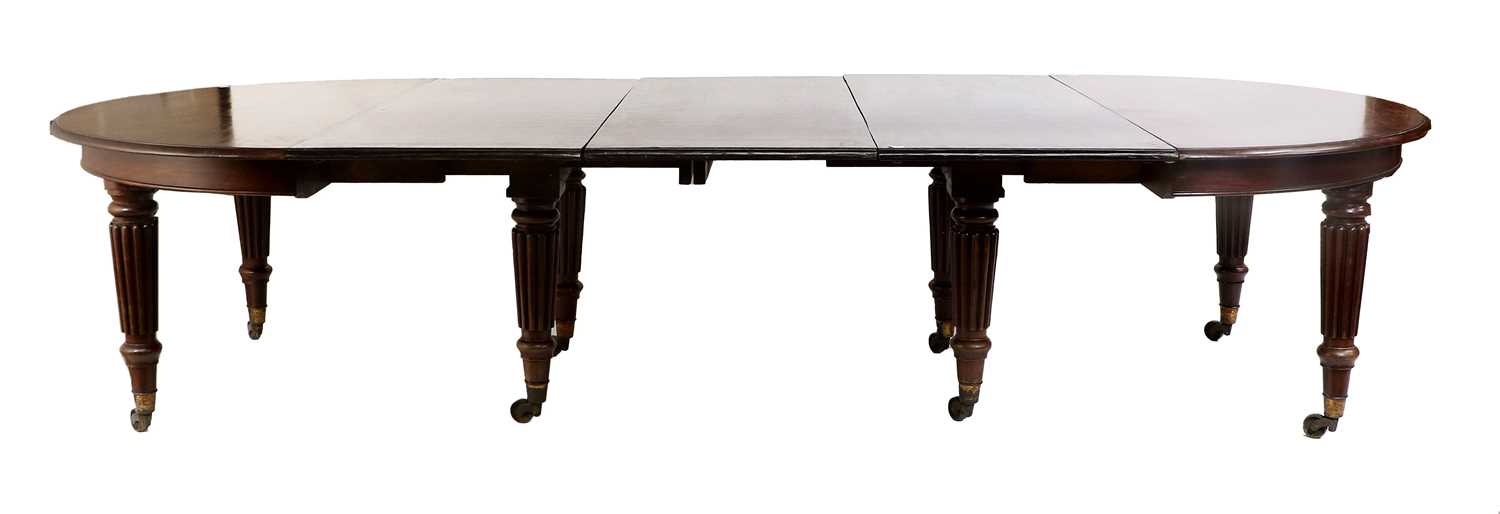 A William IV Mahogany Extending Dining Table, 2nd quarter 19th century, of D-shape form with three