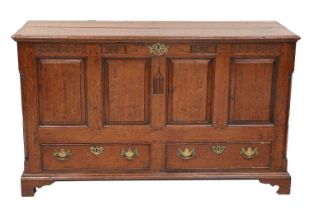A George III Oak and Mahogany-Crossbanded Chest, late 18th century, the hinged lid above a guilloche
