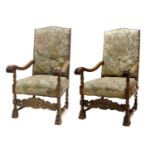 A Pair of Late 19th Century Carved Walnut Renaissance-Style Open Armchairs, covered in close-