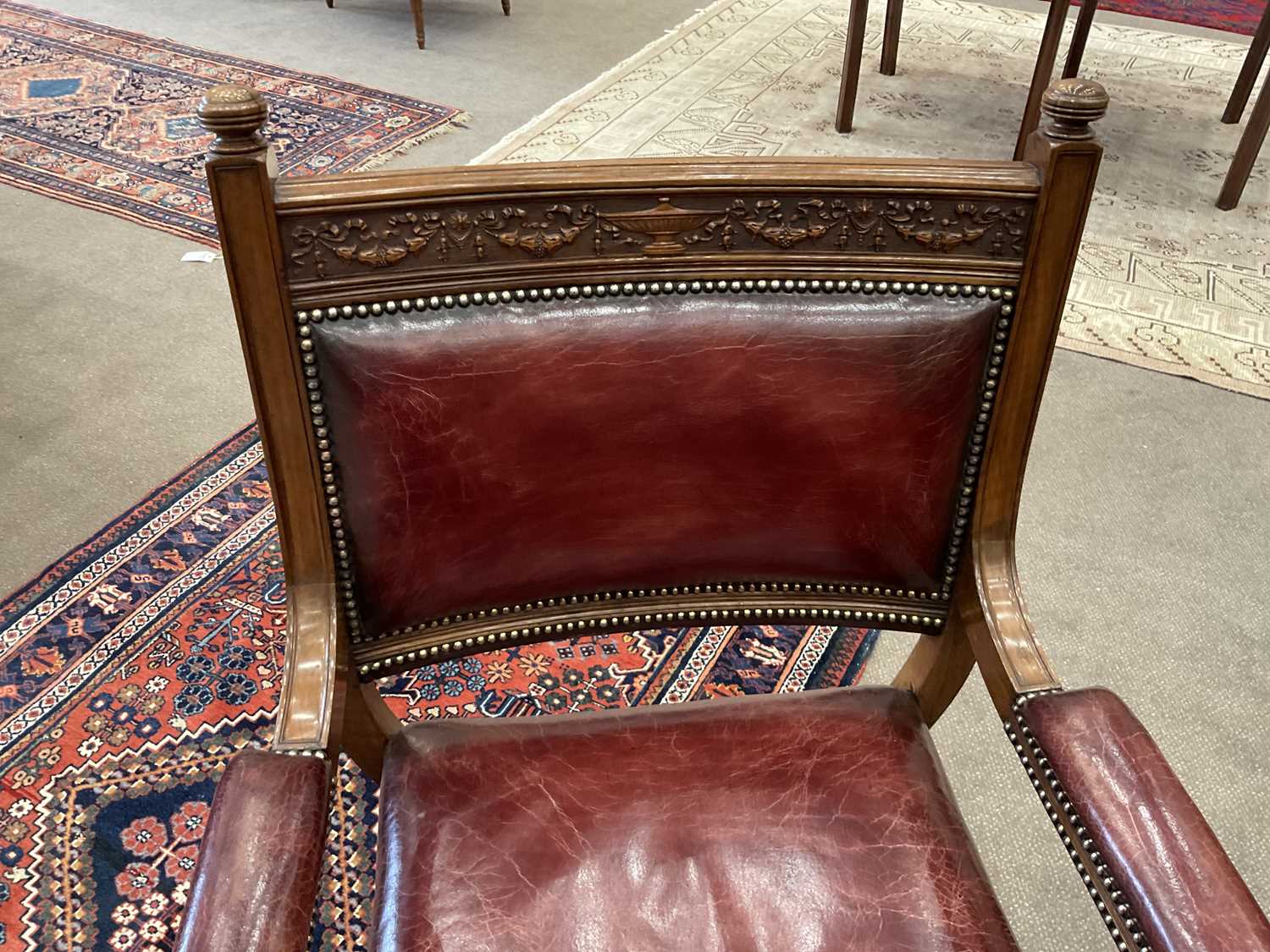 A Victorian Walnut X-Form Chair, late 19th century, recovered in red close-nailed leather, the - Image 5 of 5