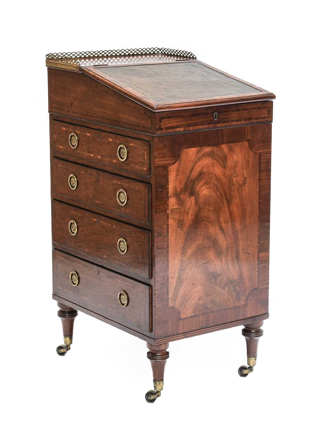 A Gillows Mahogany Davenport, circa 1810-20, with a pierced three-quarter brass gallery above a