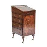 A Gillows Mahogany Davenport, circa 1810-20, with a pierced three-quarter brass gallery above a