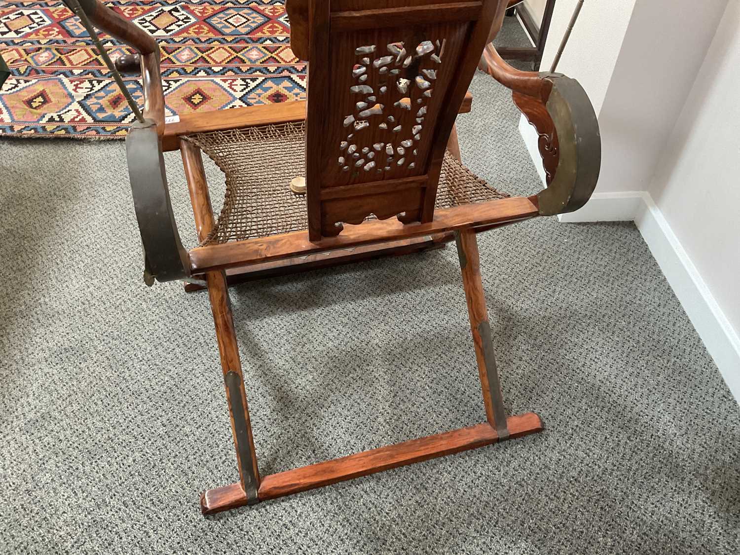 A Pair of 20th Century Chinese Hardwood Horseshoe-Back Folding Chairs, each with metal bands and - Image 11 of 16