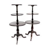 A Pair of George III Mahogany Three-Tier Dumb Waiters, early 19th century, of dished circular form