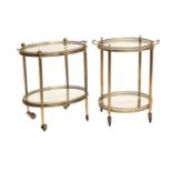 A Mid-20th Century Two-Tier Brass and Glass Oval Tea Trolley, with pierced border, scrolled