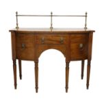 A George III Mahogany, Satinwood-Banded, Boxwood and Ebony-Strung Bowfront Sideboard, circa 1800,