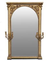 A Victorian Gilt and Gesso Girandole Mirror, 2nd half 19th century, the arched bevelled glass