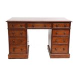 A Victorian Mahogany Double Pedestal Desk, 3rd quarter 19th century, the rectangular moulded top