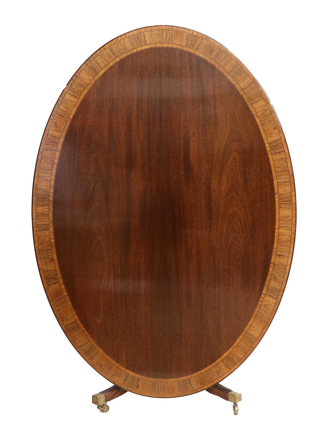 A Reproduction Mahogany, Rosewood-Crossbanded, Boxwood and Ebony-Strung Dining Table, the oval