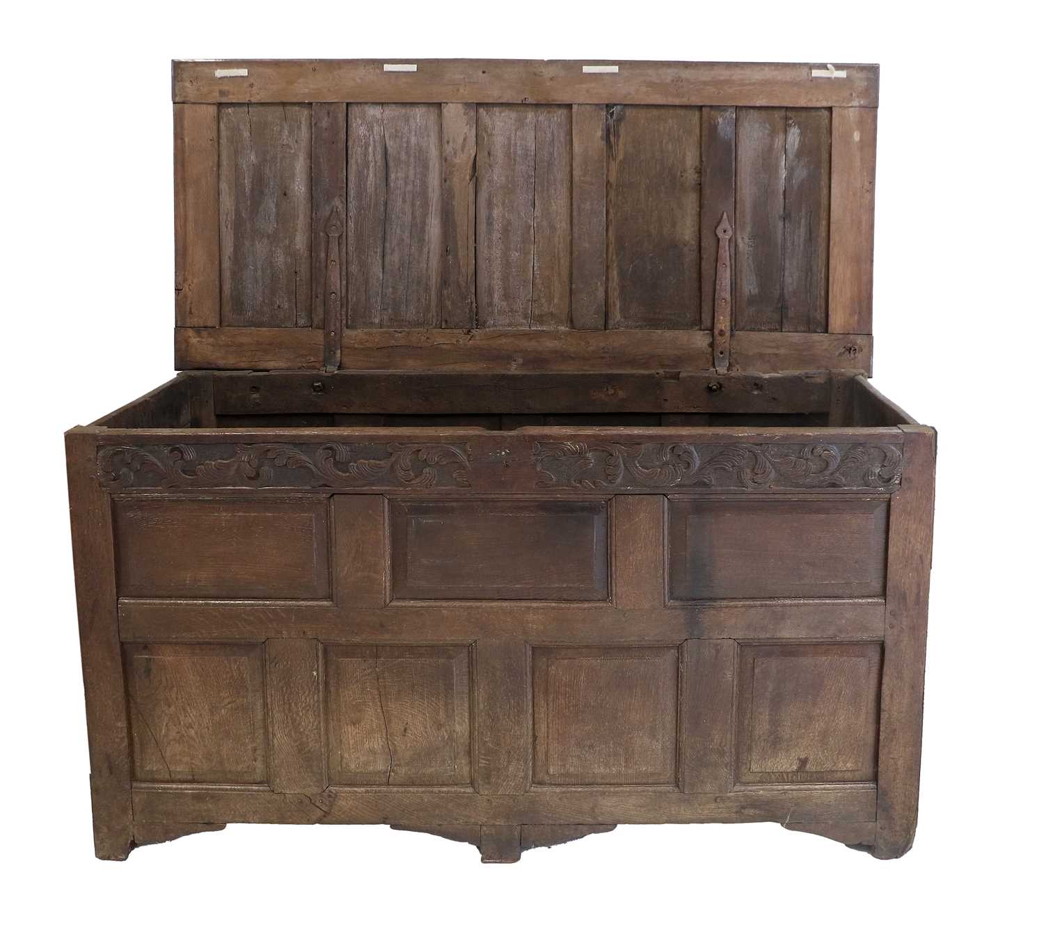 A Late 17th/Early 18th Century Joined Oak Chest, the hinged lid with four moulded panels enclosing a