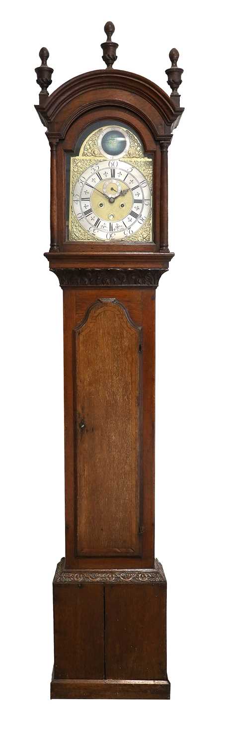 An Oak Eight Day Longcase Clock, arch pediment, arch crossbanded trunk door, carved borders, 12-inch