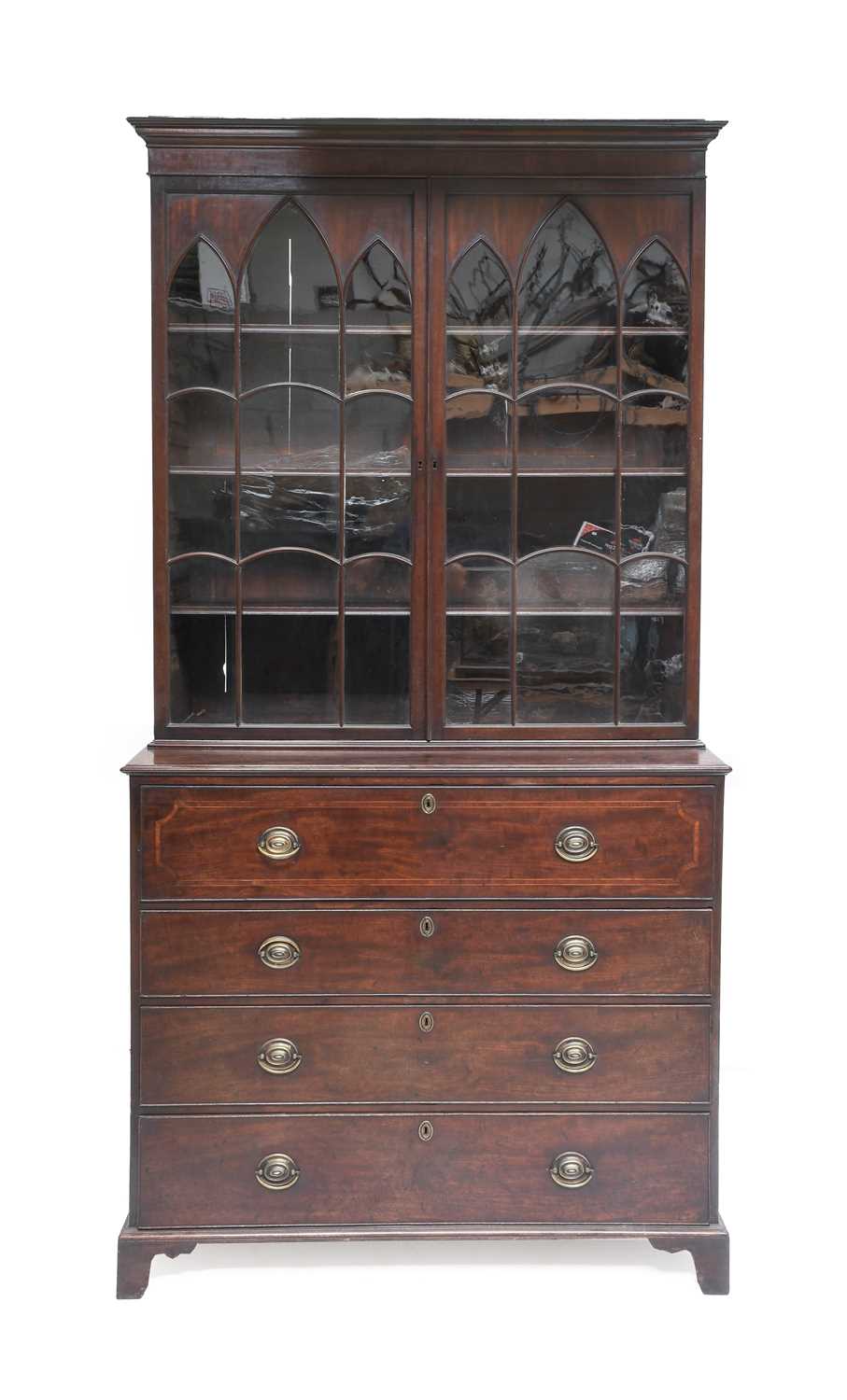 A George III Mahogany, Tulipwood-Banded and Boxwood-Strung Secretaire Bookcase, circa 1820, the