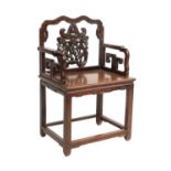 A Late 19th/Early 20th Century Carved Chinese Hardwood Open Armchair, with scrolled top rail above a