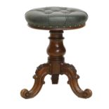 A Victorian Carved Rosewood Revolving Piano Stool, by Robert Strahan, Dublin, stamped and numbered