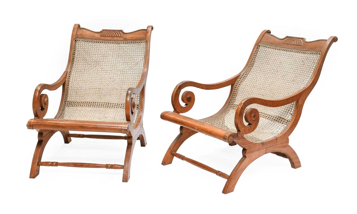 A Pair of Early 20th Century Sri Lankan Carved Hardwood Planter Chairs, with single-cane seats,