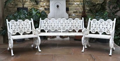 A Victorian Cast Iron and Later Painted Three Piece Garden Set, late 19th century, the foliate