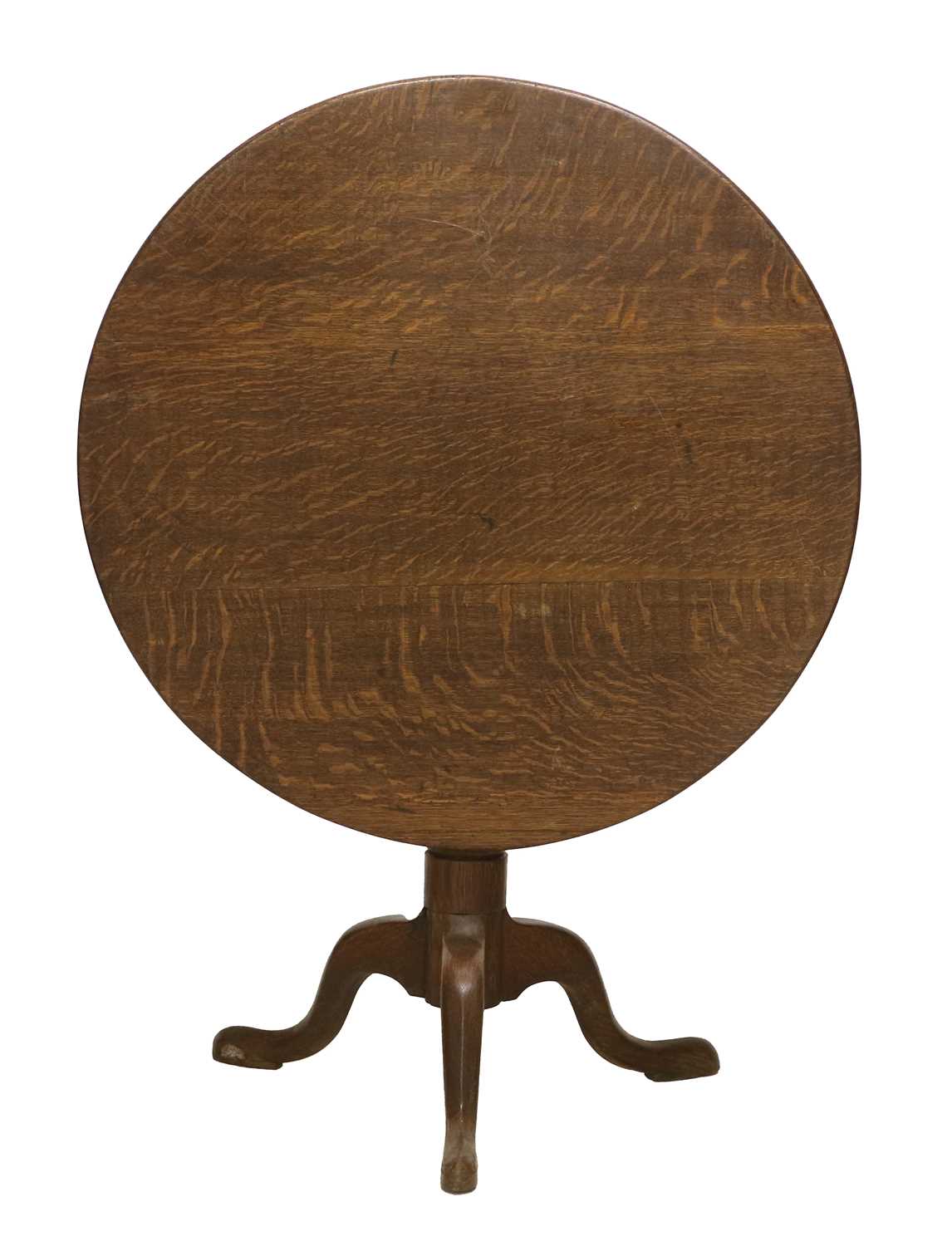 A George III Oak Circular Tripod Table, late 18th century, the flip-top on a vasiform support with