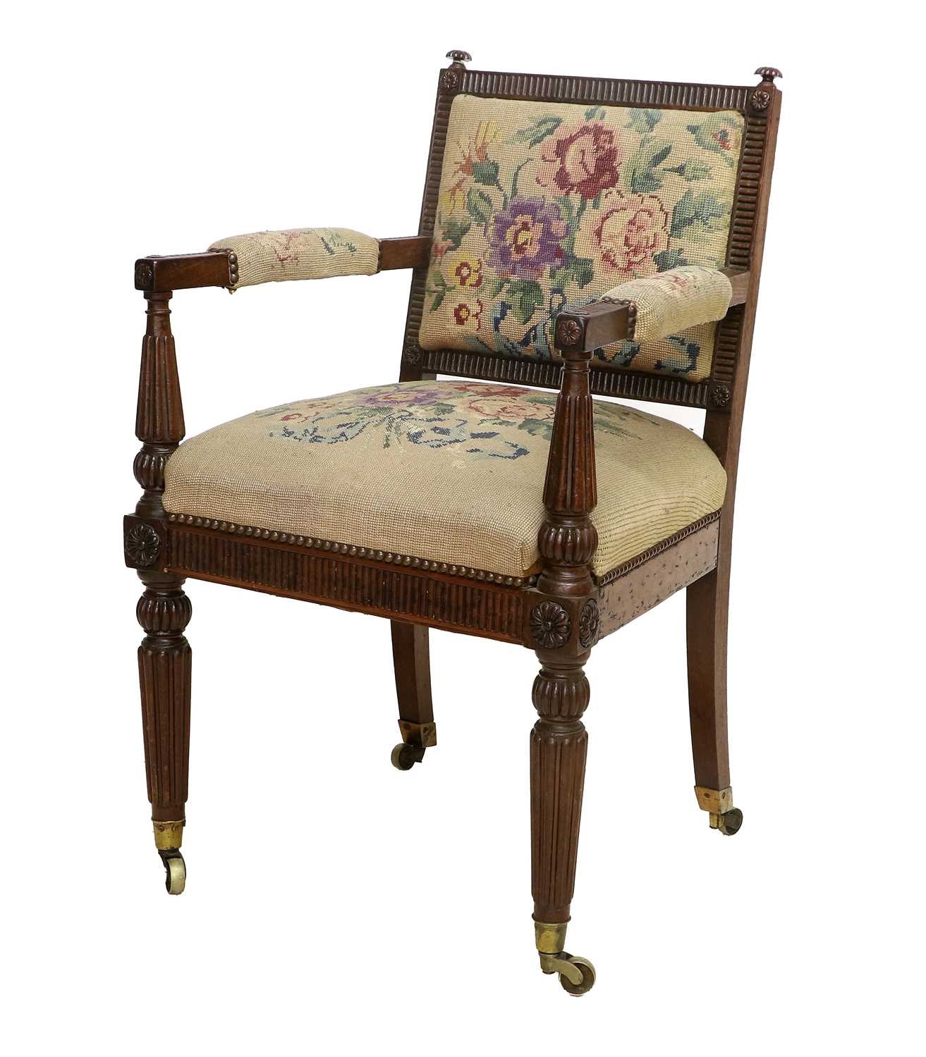 A William IV Carved Mahogany Open Armchair, 2nd quarter 19th century, covered in floral