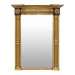 A Regency Ebonised and Parcel-Gilt Pier Glass, early 19th century, repainted, with later mirror