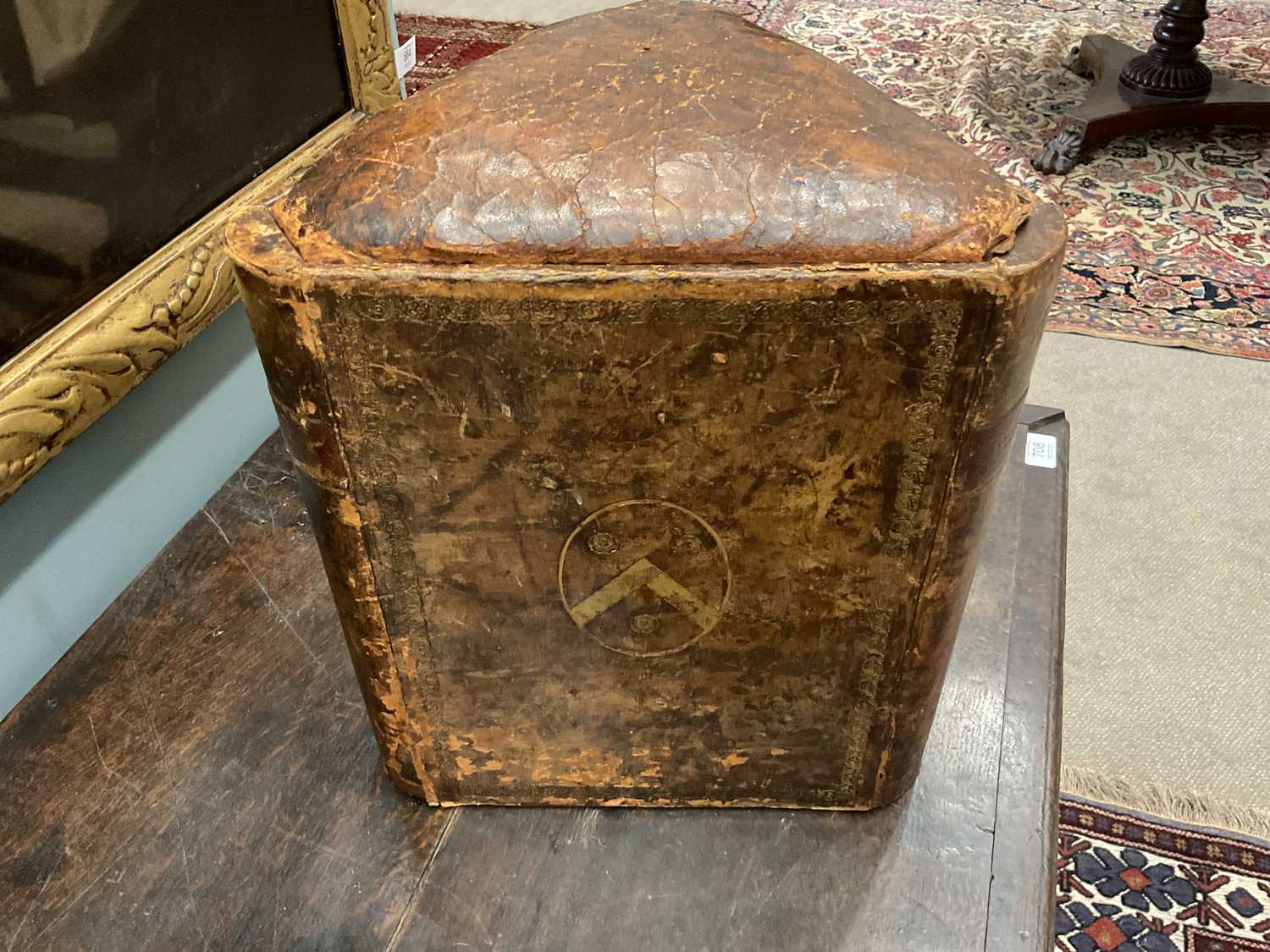 A Brown and Gilt-Tooled Leather Triangular Stool, late 19th/early 20th century, the corners as - Bild 6 aus 8