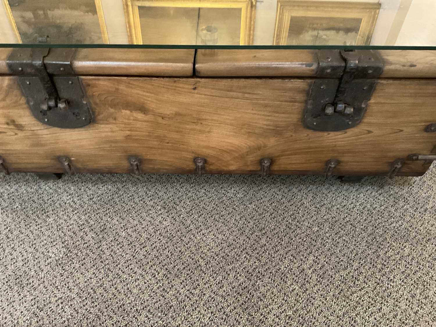 A Japanese Hardwood and Iron-Bound Trunk, modern, used as a coffee table with later glass top, the - Image 7 of 8