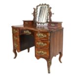 A 19th Century North European Walnut, Crossbanded and Gilt-Metal-Mounted Dressing Table, in Louis XV