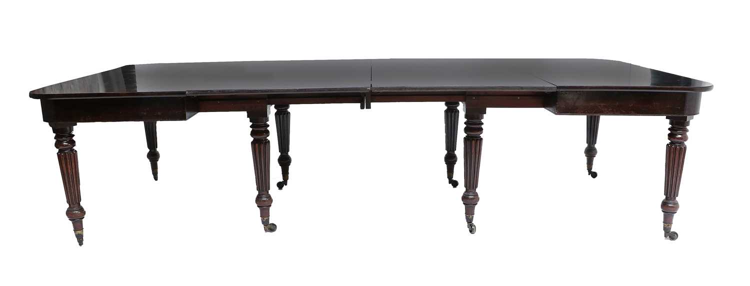 A Mahogany Extending Dining Table, in the manner of Gillows, circa 1810, the frame stamped GT