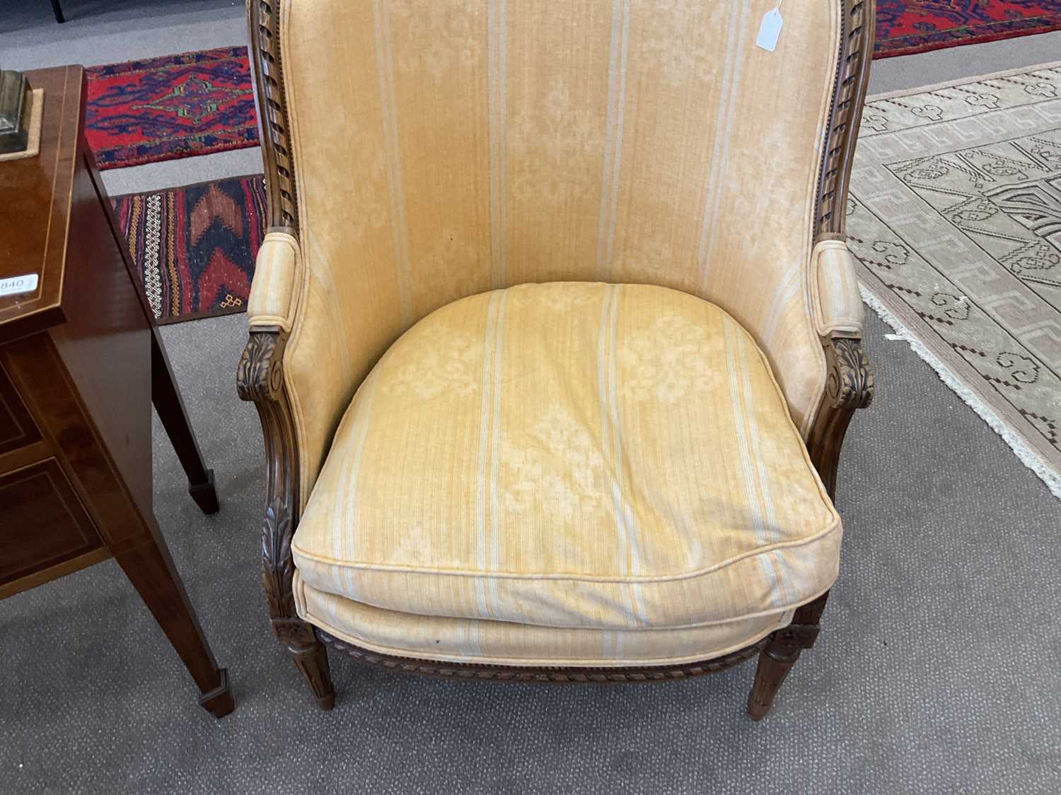 A Pair of Early 20th Century Carved Walnut or Beech Framed Tub Armchairs, recovered in orange floral - Image 9 of 10