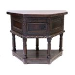 A Late 17th Century Joined and Carved Oak Credence Table, the hinged leaf pivoting above a