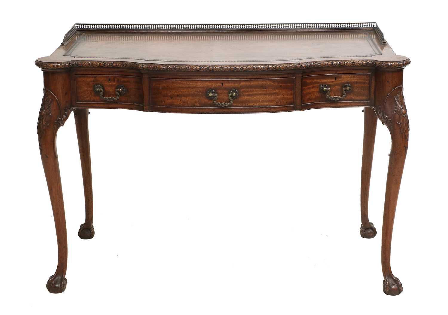 A Late 19th/Early 20th Century Carved Mahogany Writing Table, by Waring & Gillow Ltd, the three-