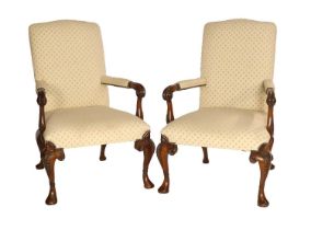 A Pair of George III-Style Mahogany or Hardwood Library Open Armchairs, of recent date, covered in