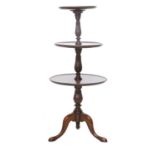 A George III-Style Mahogany Three-Tier Dumb Waiter, 20th century, bearing a Gillow stamp, of