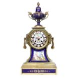 A French Gilt Metal and Blue Porcelain Mounted Striking Mantel Clock, retailed by Arnold & Lewis,