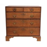 A George III Oak Straight-Front Chest of Drawers, late 18th century, with two short over three