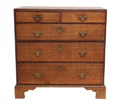 A George III Oak Straight-Front Chest of Drawers, late 18th century, with two short over three
