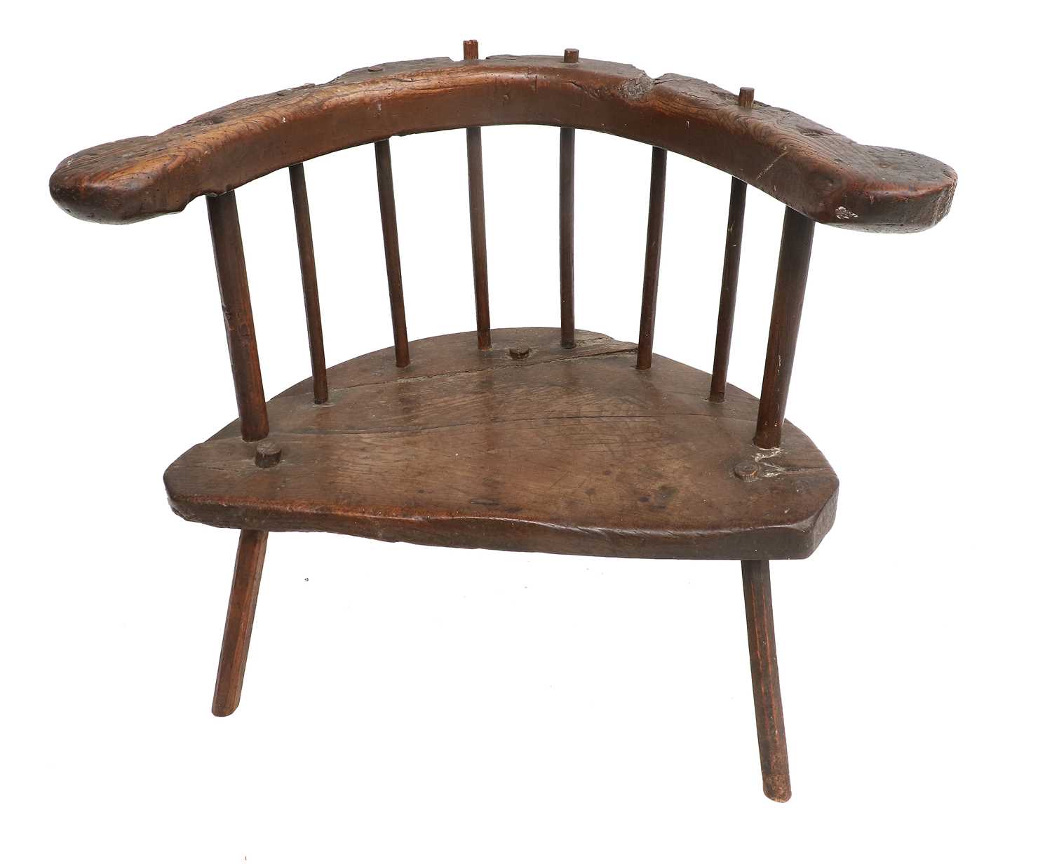 A Primitive Oak Stick-Back Armchair, probably West Country, late 18th/early 19th century, the curved