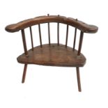 A Primitive Oak Stick-Back Armchair, probably West Country, late 18th/early 19th century, the curved