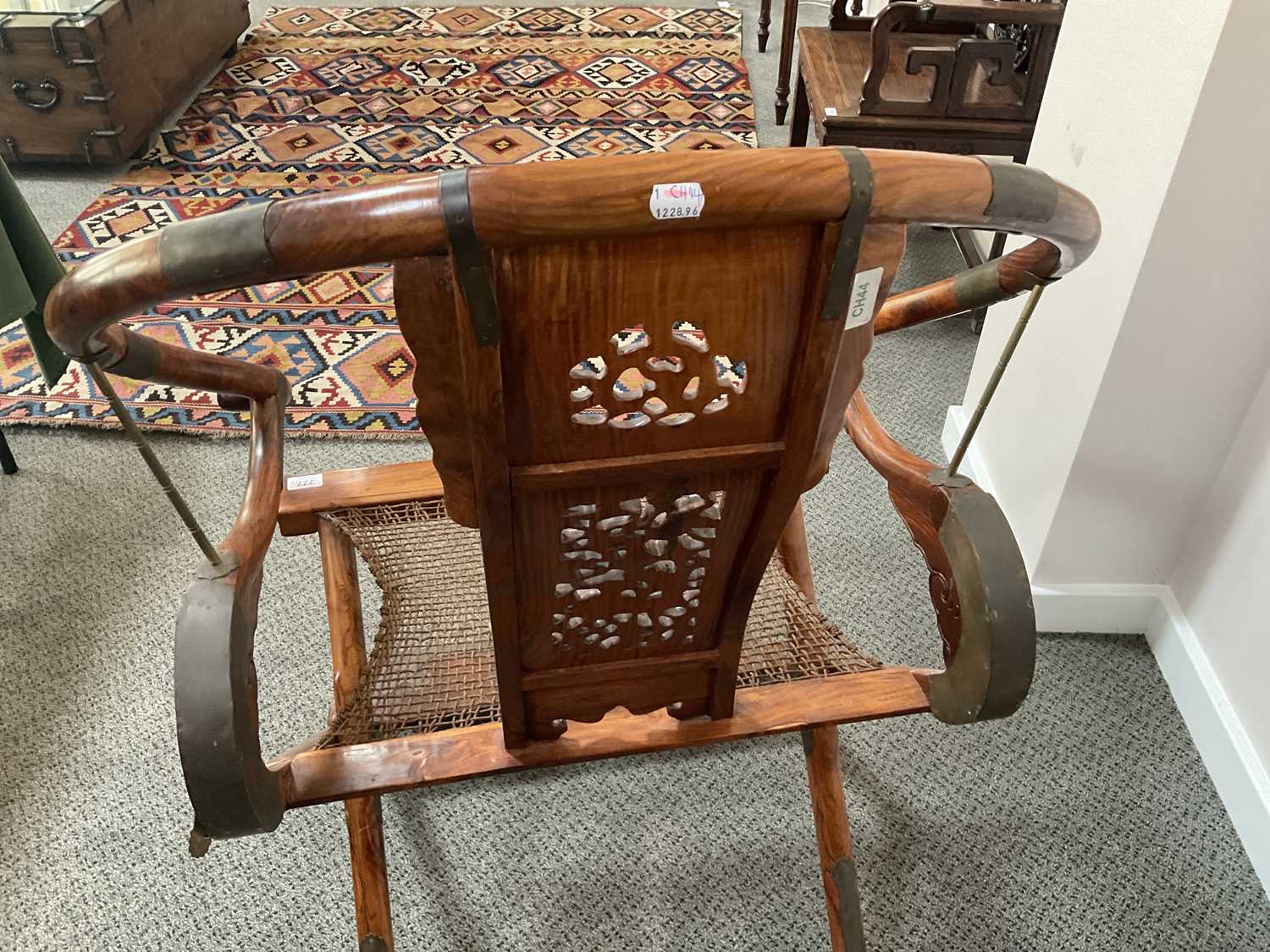 A Pair of 20th Century Chinese Hardwood Horseshoe-Back Folding Chairs, each with metal bands and - Image 10 of 16