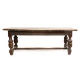 A 17th Century-Style Oak Refectory Dining Table, the rectangular top of three plank construction