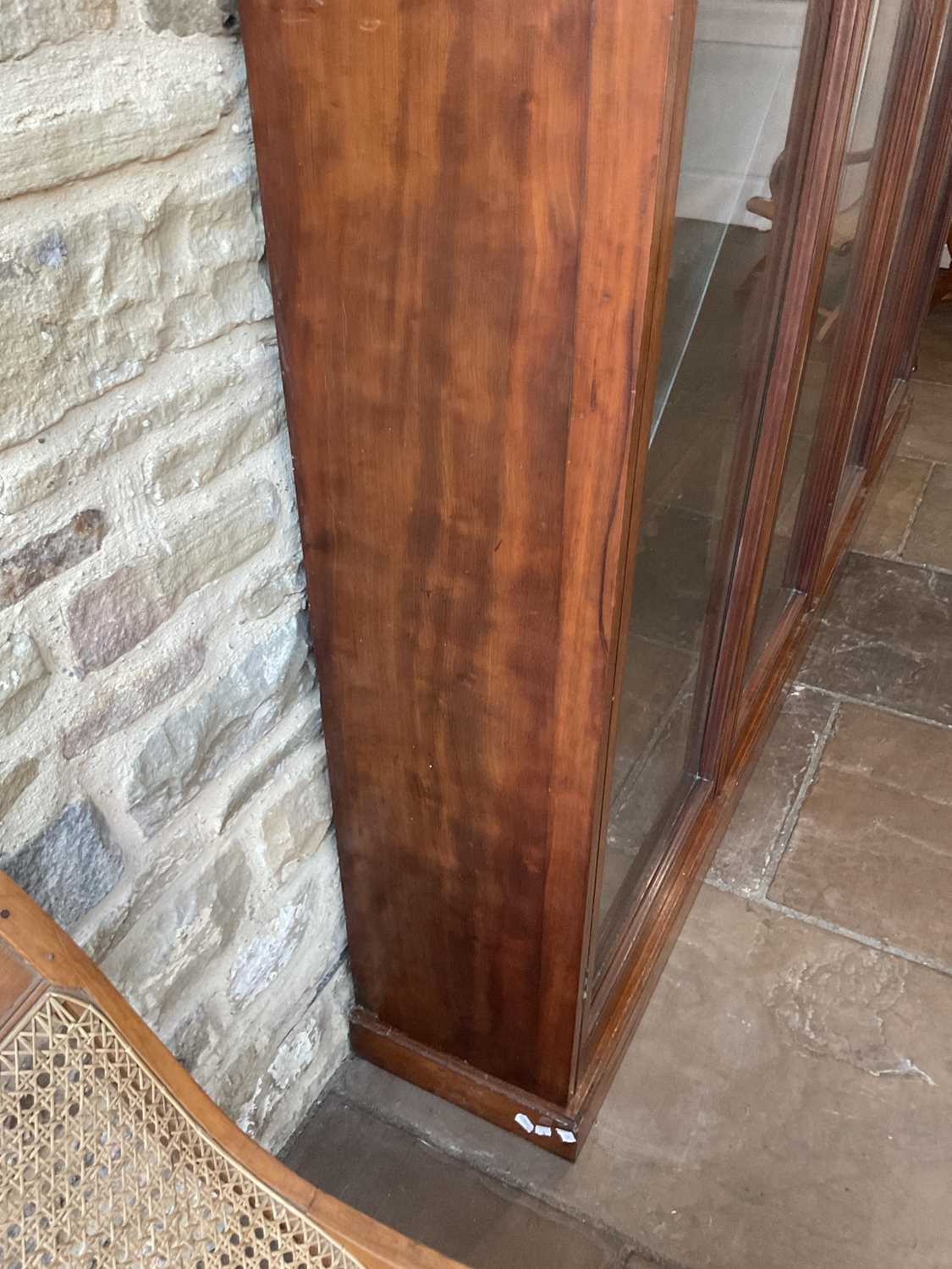 A Victorian Mahogany Bookcase, the moulded cornice above four conforming glazed doors enclosing - Image 9 of 10