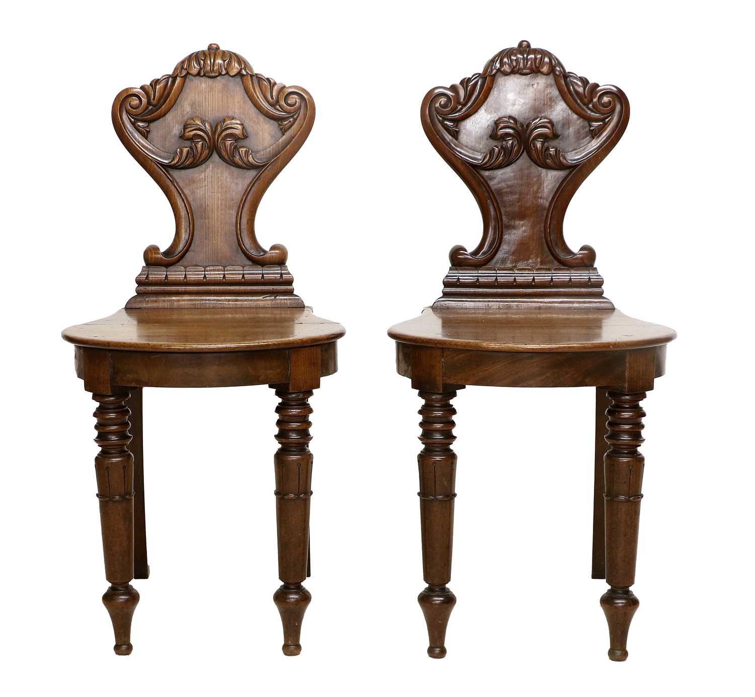 A Pair of William IV Carved Mahogany Hall Chairs, 2nd quarter 19th century, the acanthus leaf-carved - Image 2 of 2