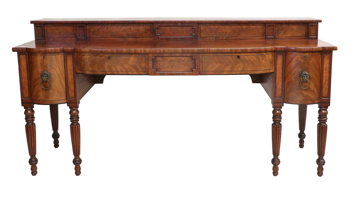 A Regency Mahogany and Ebony-Strung Bowfront Sideboard, in the manner of Gillows, early 19th
