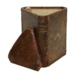 A Brown and Gilt-Tooled Leather Triangular Stool, late 19th/early 20th century, the corners as