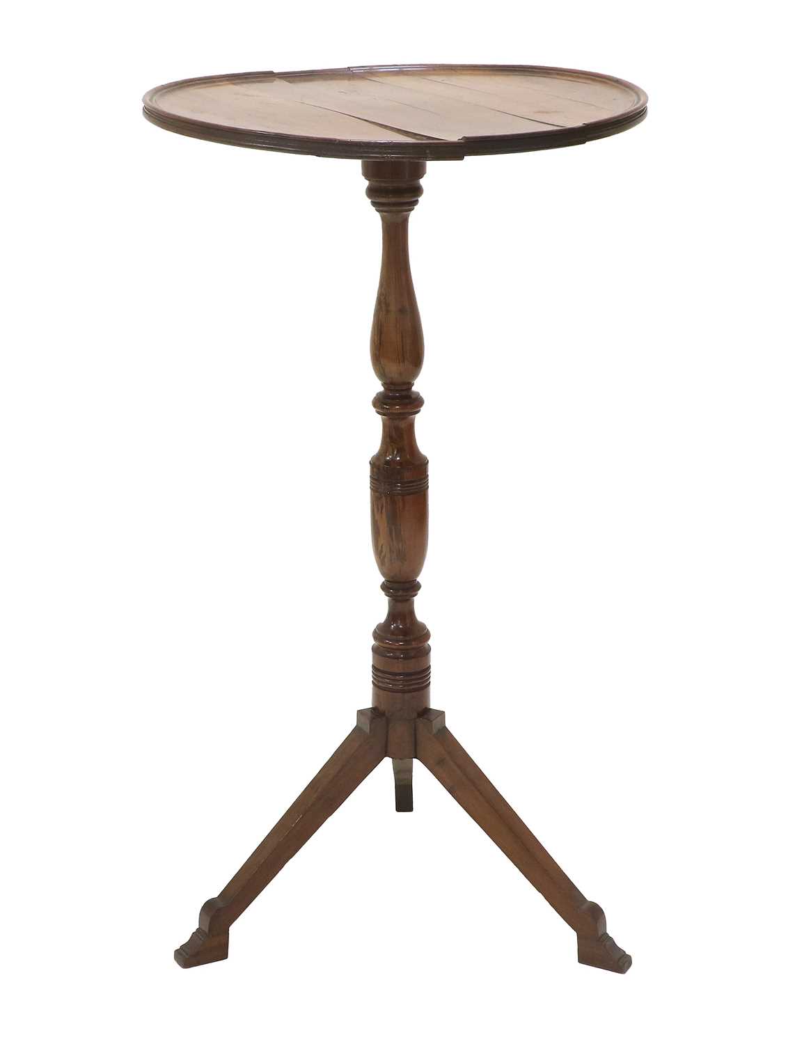 An Early 19th Century Solid Yewwood Tripod Table, the top of dished circular form, on a baluster